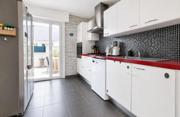 Maison 4 chambres avec jardin, garage et deux terrasses - Secteur recherché