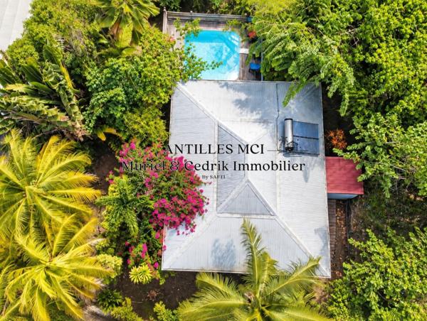 Un cocon tropical avec piscine, proche de tout