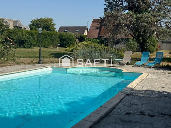 Charmante maison avec garage, carport et piscine