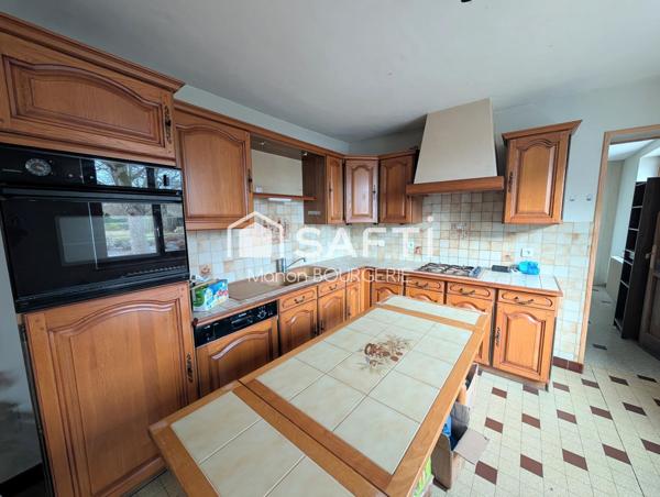 Maison de village : le charme d'un ancien hôtel aux volumes généreux