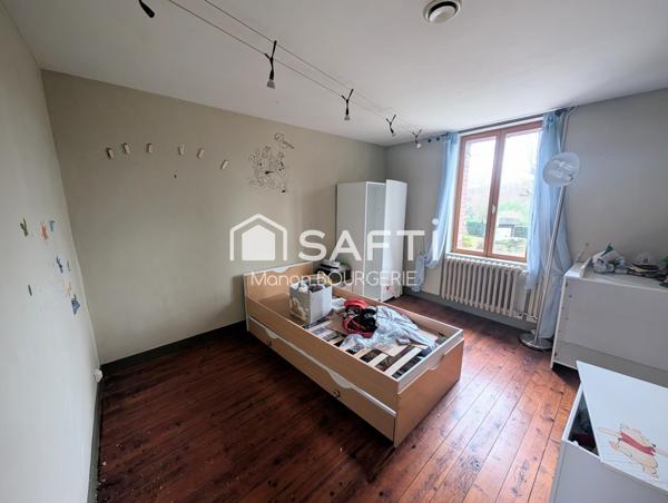 Maison de village : le charme d'un ancien hôtel aux volumes généreux