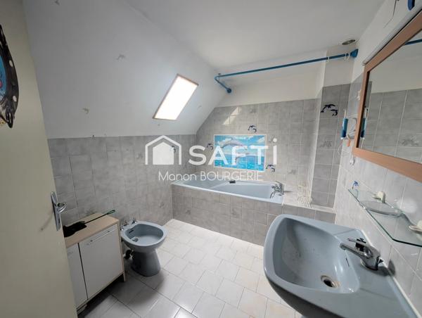 Maison de village : le charme d'un ancien hôtel aux volumes généreux