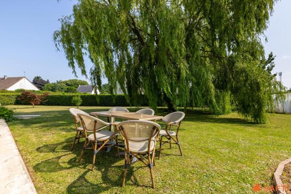 Maison familiale avec grand jardin et véranda