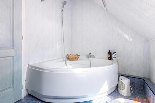 Maison familiale avec grand jardin et véranda