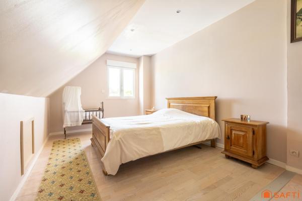 Maison familiale avec grand jardin et véranda