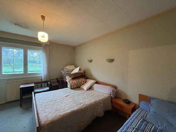 Maison des années 70 avec plus de 2500m2 de jardin située à Voivres-Les-Le-Mans