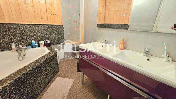 Maison familiale 5 chambres – Sous-sol complet & dépendance – Plein centre d'Artemare