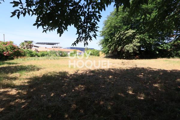 Terrain en zone 1AUE2 à fort potentiel avec une maison de 120m²