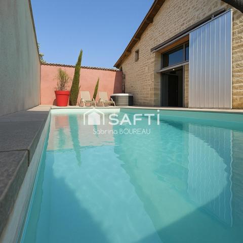 Ancienne grange rénovée en loft industriel avec piscine