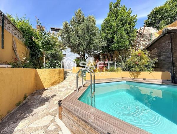 Maison T6 atypique + studio indépendant, terrasse, jardin et piscine hors-sol.