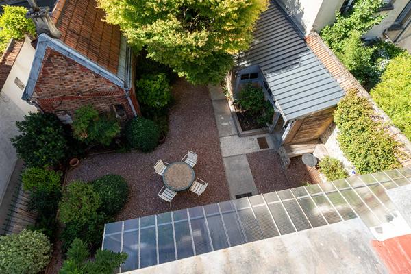 Maison avec jardin, garage et atelier