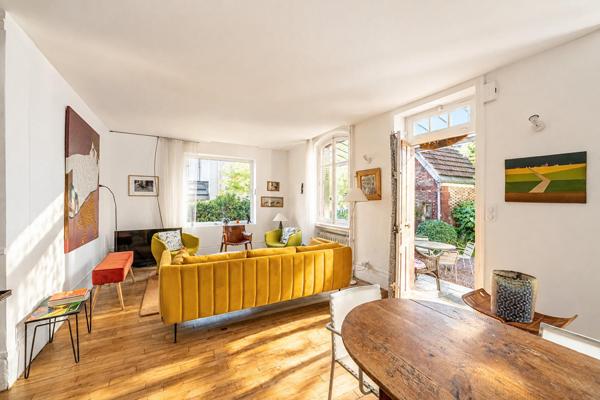 Maison avec jardin, garage et atelier