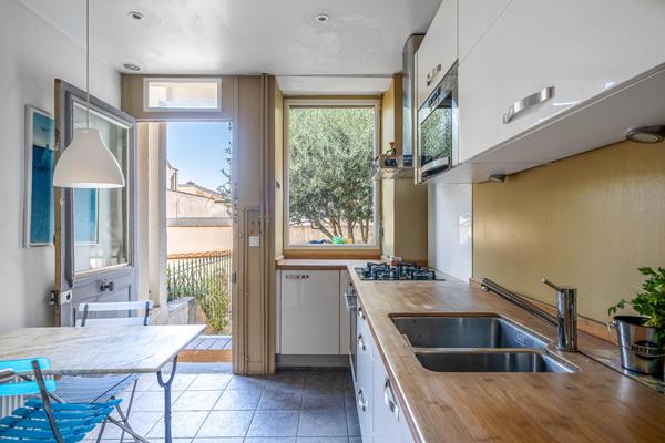 Maison avec jardin, garage et atelier