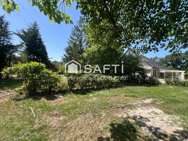 Maison de plain-pied avec dépendances, étang, potager et terrain arboré de 5317 m²