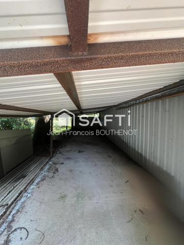 Maison de plain-pied avec dépendances, étang, potager et terrain arboré de 5317 m²