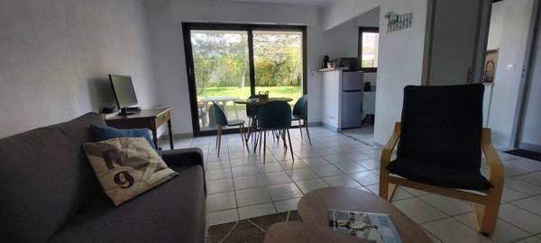 Appartement 2 pièces avec jardin terrasse et garage proche Marché