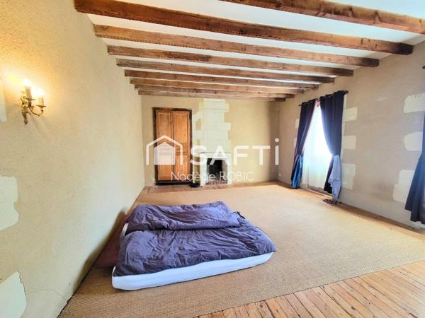 Maison de maître avec dépendances et troglodytes