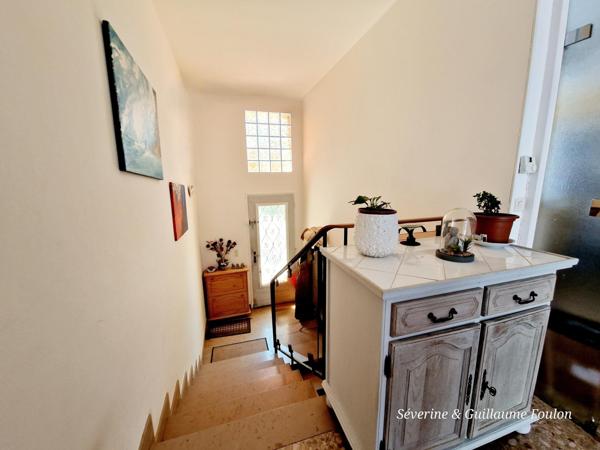 maison en centre ville d'APT avec 2 chambres, garage, un sous-sol total et une grande cour