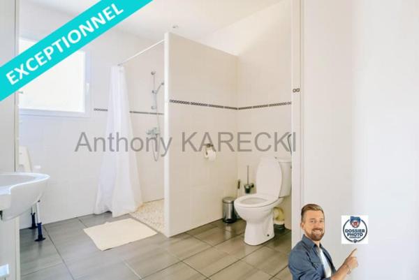 Grande pièce de vie + 3 chambres + grand garage + parkings