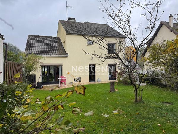 Maison spacieuse à vendre à Domont - 4 chambres, jardin et garage