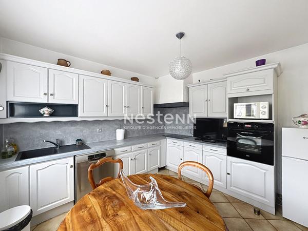 Maison spacieuse à vendre à Domont - 4 chambres, jardin et garage