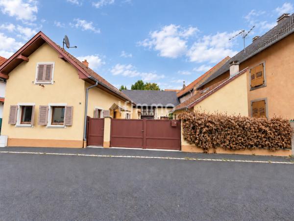 Belle opportunité : maison avec grange, jardin , garage et dépendance