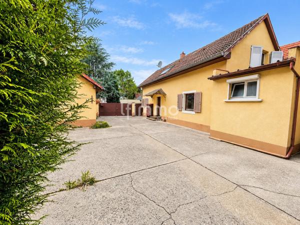 Belle opportunité : maison avec grange, jardin , garage et dépendance