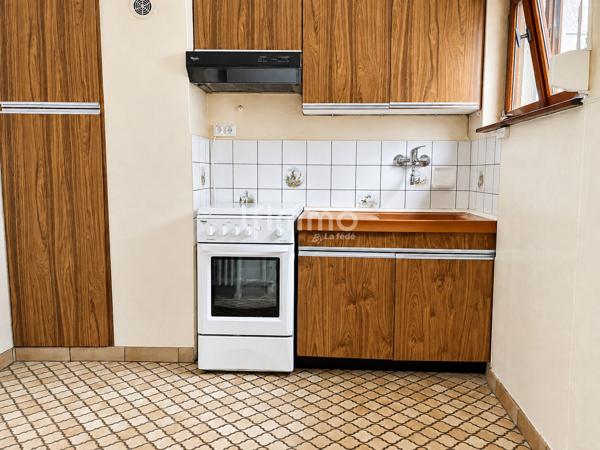Belle opportunité : maison avec grange, jardin , garage et dépendance