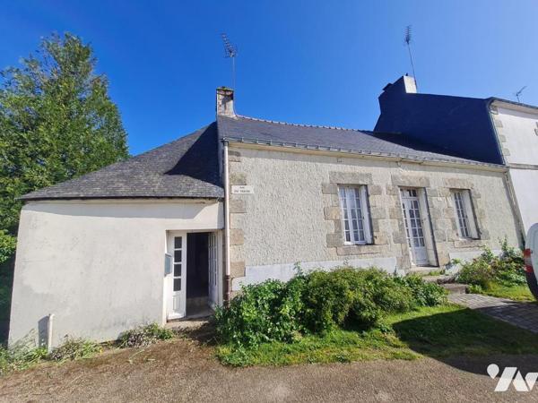 Maison mitoyenne à rénover 