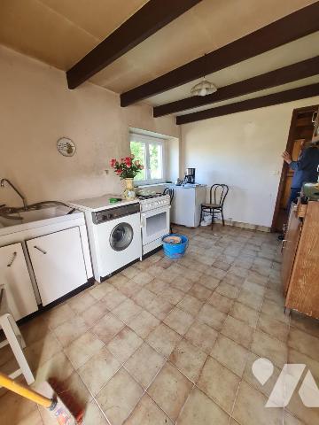 Maison mitoyenne à rénover 