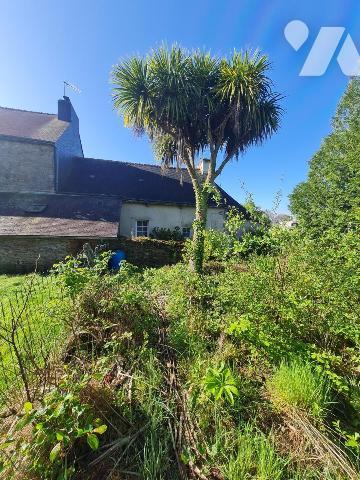 Maison mitoyenne à rénover 