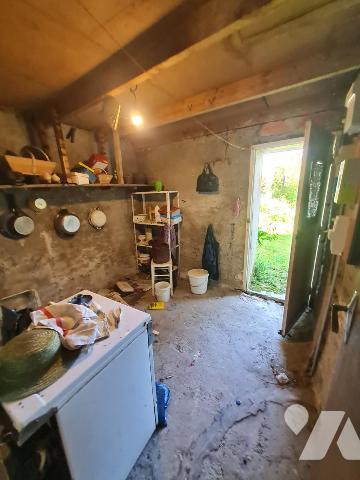 Maison mitoyenne à rénover 