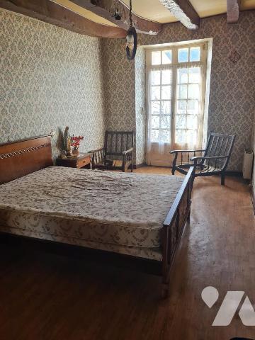 Maison mitoyenne à rénover 