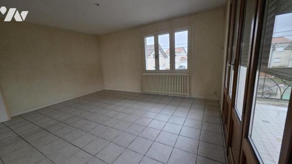 Appartement à avec cour et garage