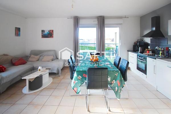 Bel appartement de 63m2 2 Chambres, Terrasse, cave et garage!