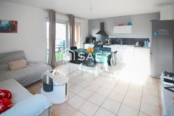 Bel appartement de 63m2 2 Chambres, Terrasse, cave et garage!
