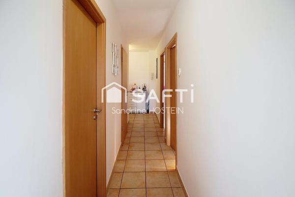 Bel appartement de 63m2 2 Chambres, Terrasse, cave et garage!