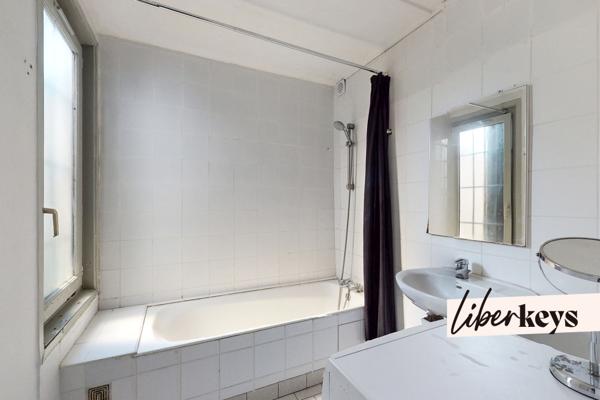 Appartement vendu loué à Saint-Ouen – Cour privative et double cave