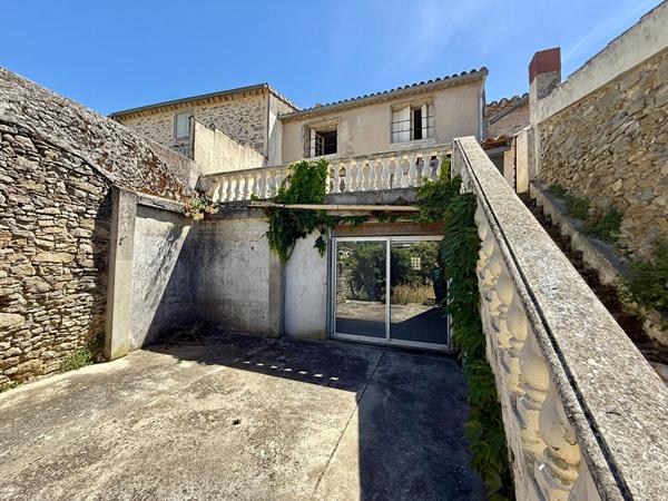 Maison de 198 m² avec deux logements distincts, terrasse, jardin et fort potentiel d'acquisition familiale ou patrimoniale