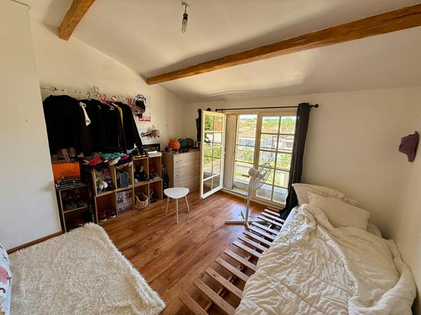 Maison de 198 m² avec deux logements distincts, terrasse, jardin et fort potentiel d'acquisition familiale ou patrimoniale
