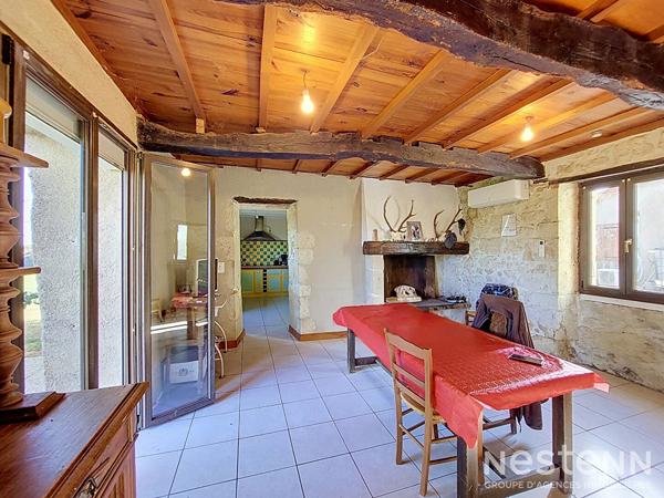 A Vendre Propriété de plus de 2 hectares avec trois maisons d'habitation en pierre et dépendances