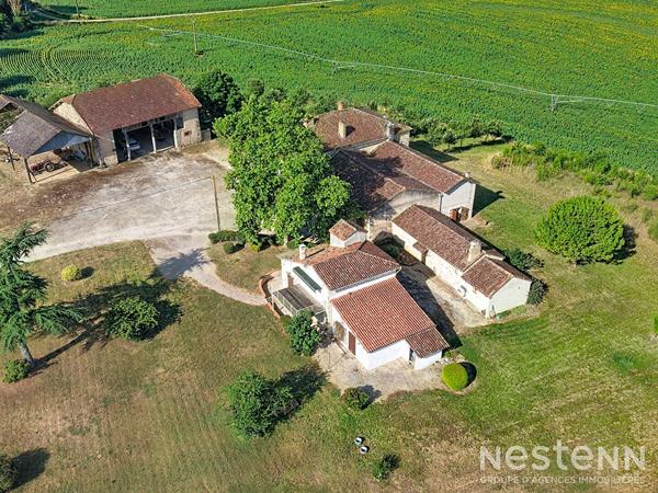 A Vendre Propriété de plus de 2 hectares avec trois maisons d'habitation en pierre et dépendances