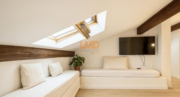 T2 atypique 50m2 au sol, centre-ville, bel immeuble