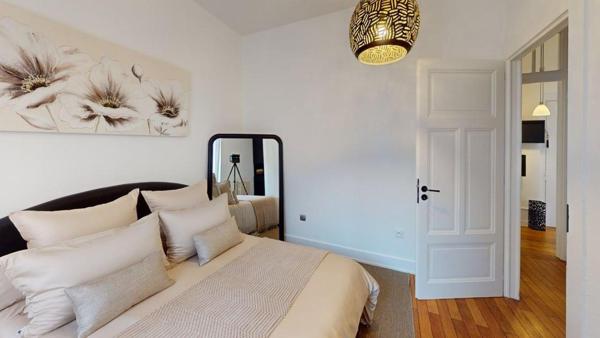 ELEGANCE HAUSSMANIENNE POUR CE T3 A ANNEMASSE