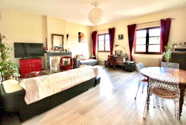 Appartement ancien 3 pièces 92 m² avec cave et parking