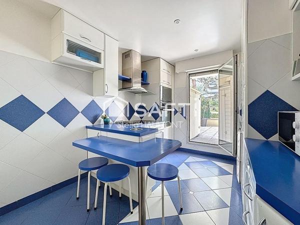 Appartement spacieux avec terrasse, parking et cave au cœur de Bécon