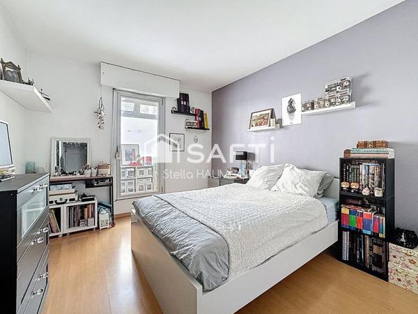 Appartement spacieux avec terrasse, parking et cave au cœur de Bécon