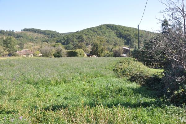 AURIGNAC proche, terrain à bâtir de 1220m² exposé sud ouest. prix : 24.000 € CC