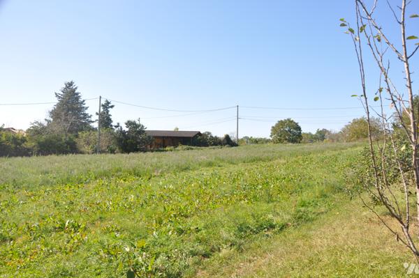 AURIGNAC proche, terrain à bâtir de 1220m² exposé sud ouest. prix : 24.000 € CC