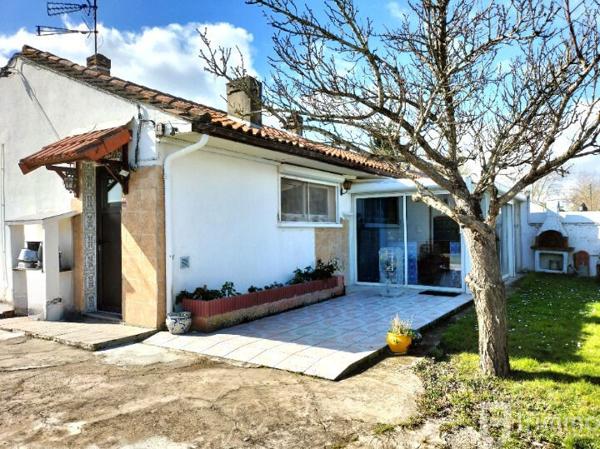 Charmante maison avec jardin et véranda